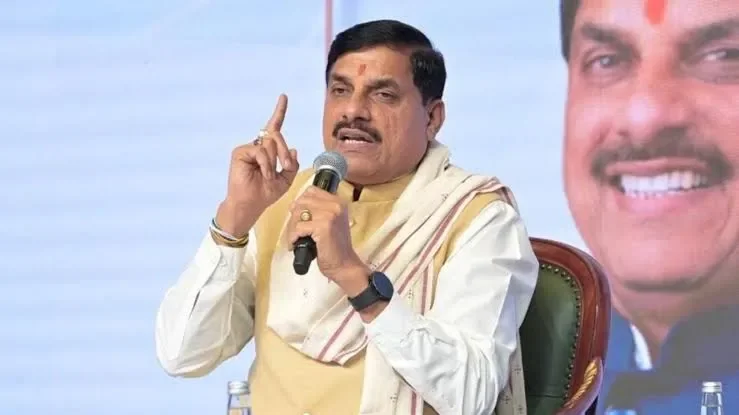 Madhya Pradesh Chief Minister Mohan Yadav speaking into a microphone