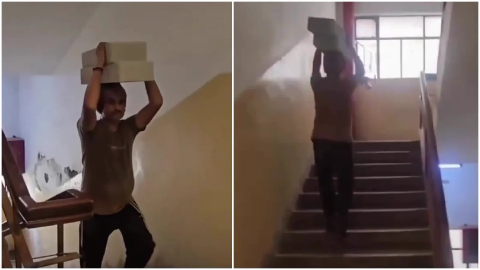 A labourer carries blocks up the stairs of a building.