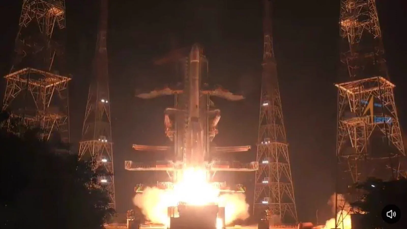 A rocket lifts off at night from the launch pad.