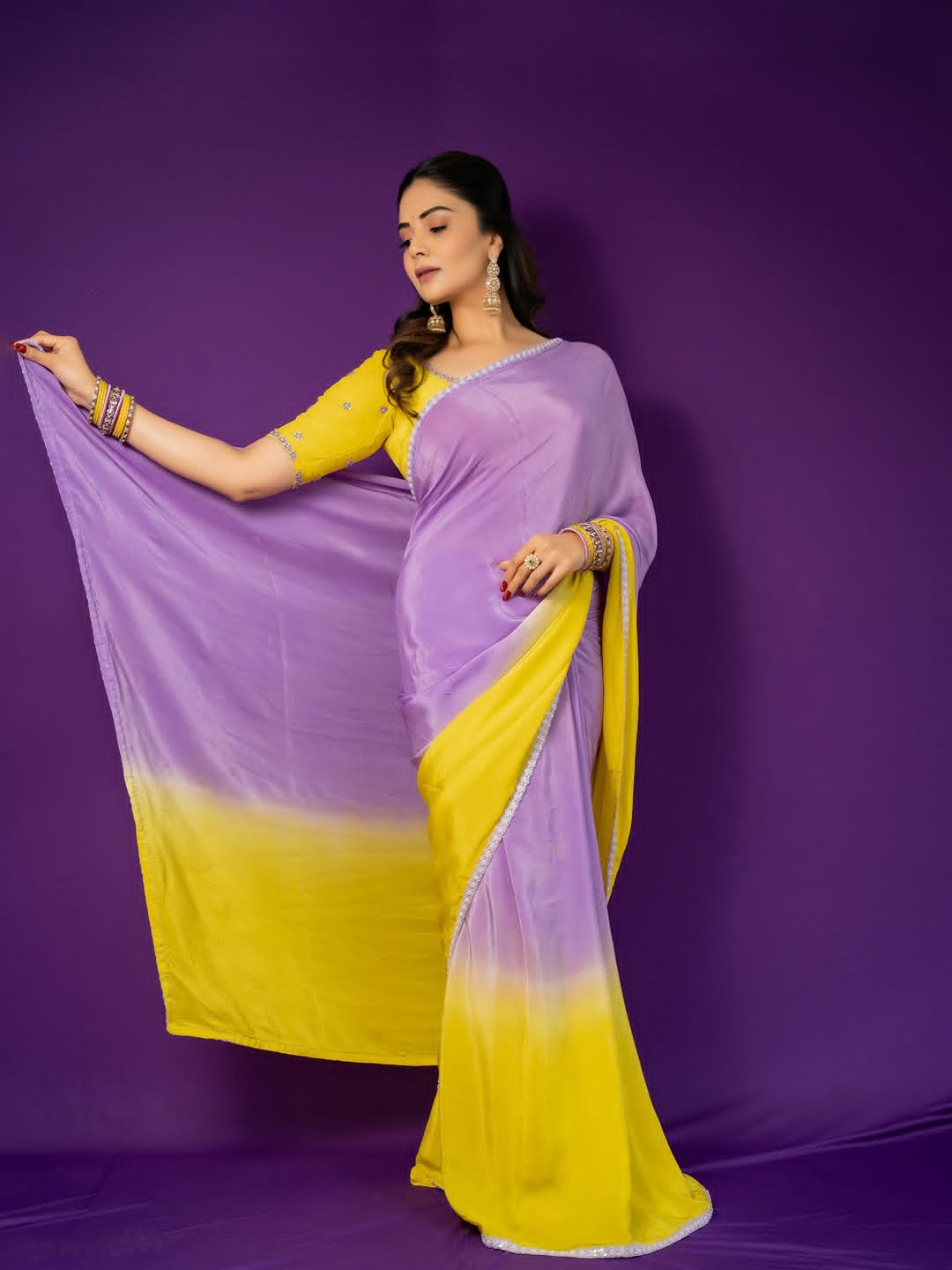 The beauty of Shrimukhi in the bright colors of the sari